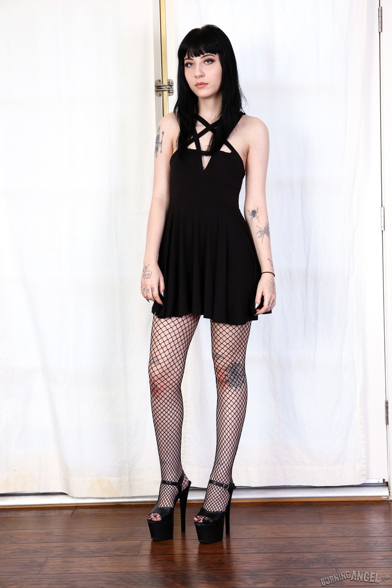 Tattooed Girl Wearing Fishnet Stockings 04