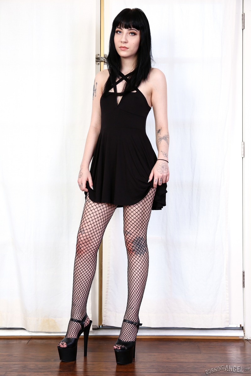 Tattooed Girl Wearing Fishnet Stockings 06