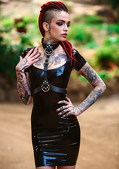 Tattooed Girl In Black Latex Dress